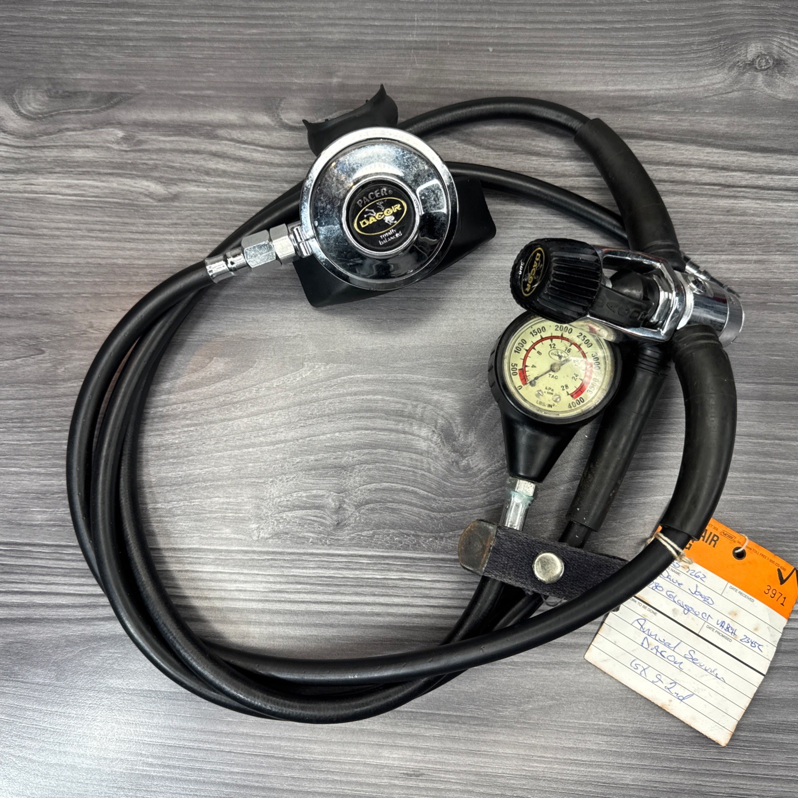 DACOR DIVING EQUIPMENT- REGULATOR PRESSURE GAUGE PACER MOUTH PIECE – SERVICE TAG
